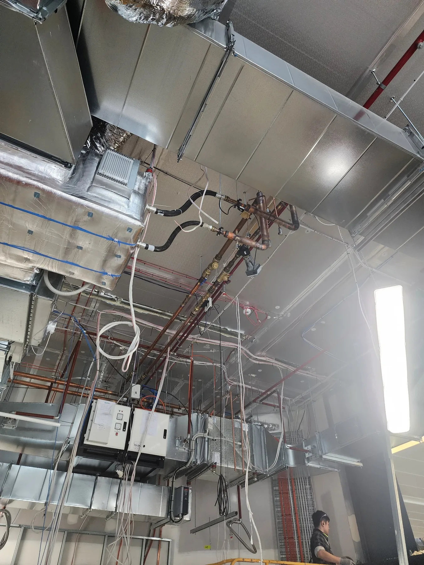 Commercial mechanical ductwork under construction