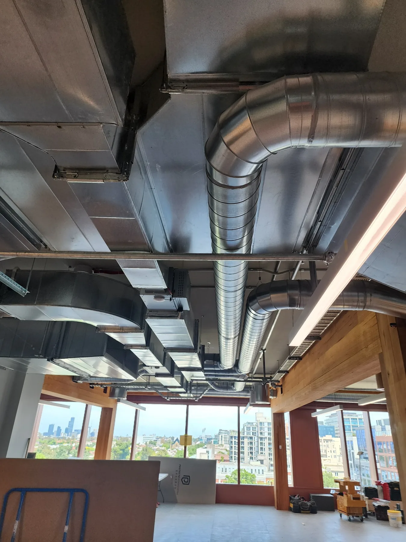 Architectural exposed ductwork in commercial interior